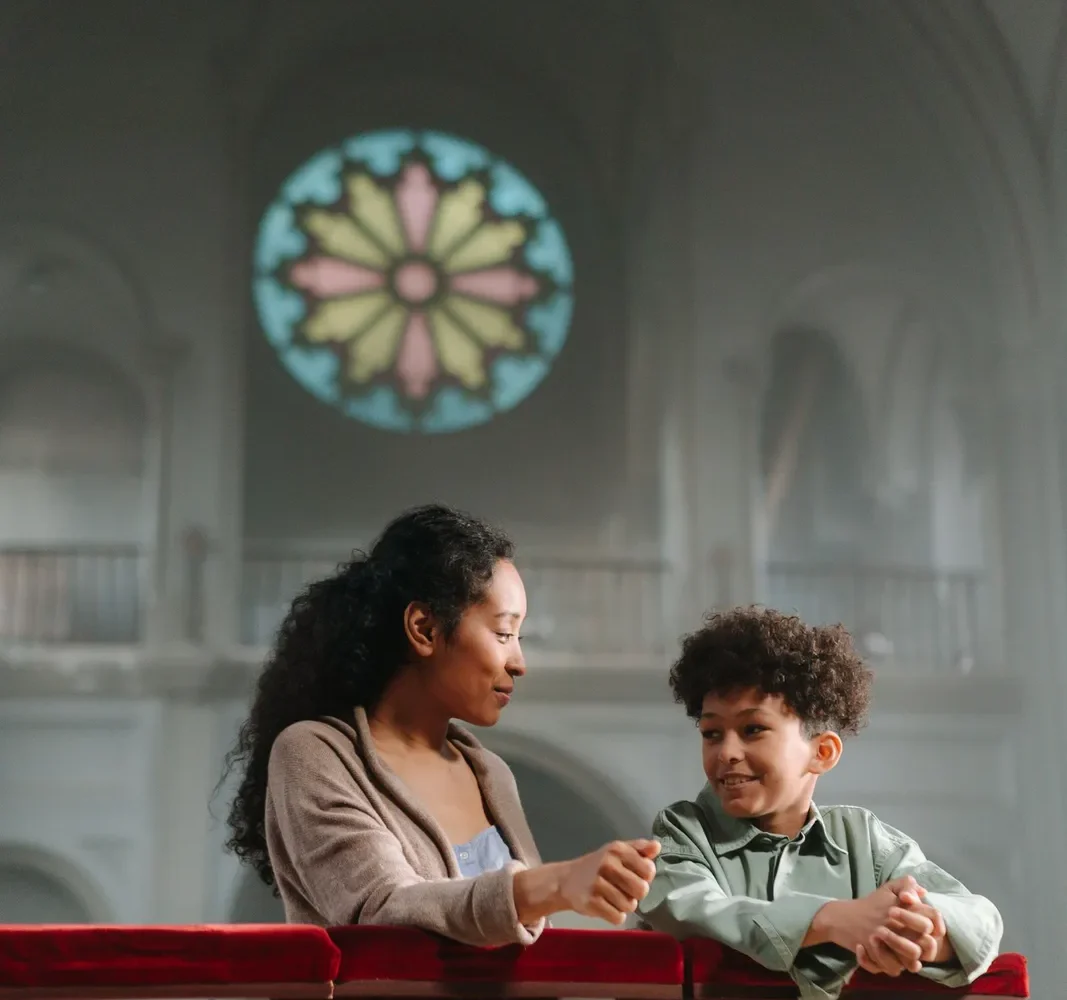 Parent child praying together