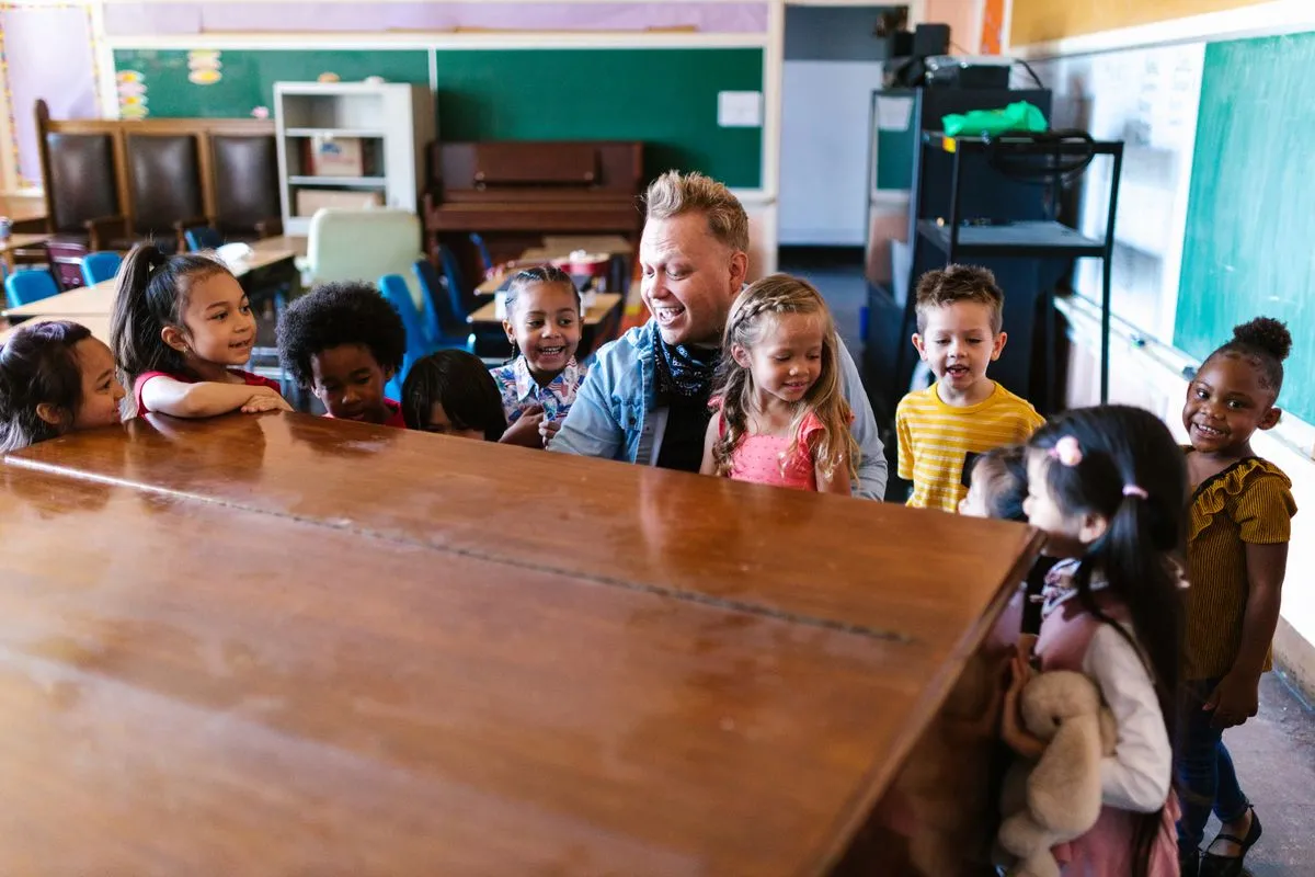 A leader teaching a small group of children in a classroom