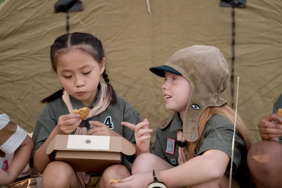 Two children working craft together