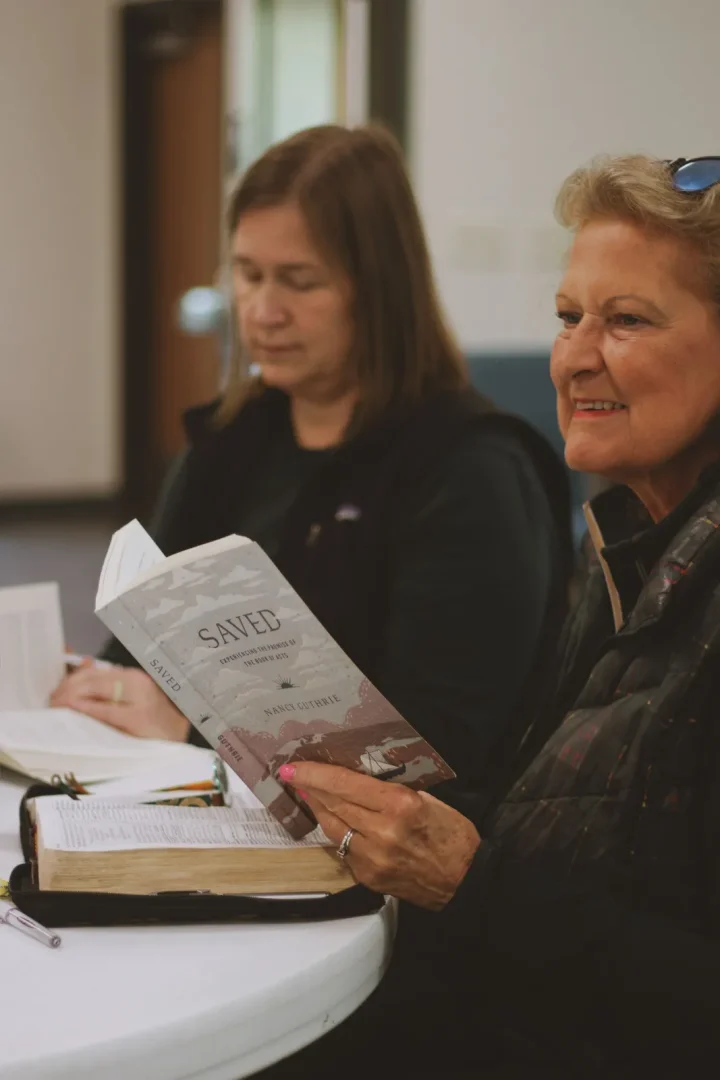 Woman reading scripture womens bible study
